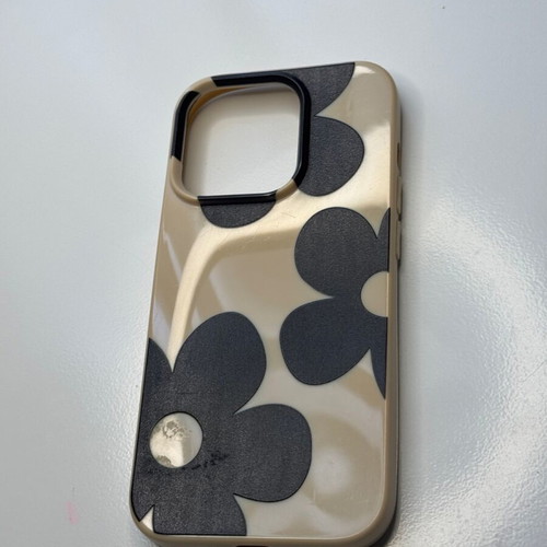 iPhone 15 Pro case used cream beige with black flowers