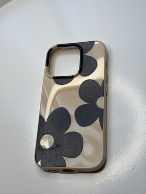 iPhone 15 Pro case used cream beige with black flowers