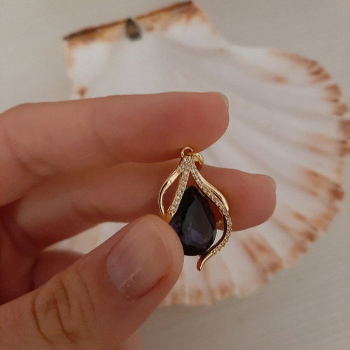 Pendant for necklace new, steel, gold color with purple stone