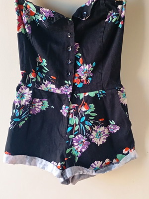 Women's romper like new, black with colorful floral print, size XS