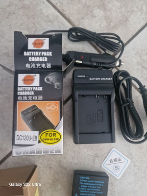 Battery charger for camera or camcorder new, model DC120U-E8