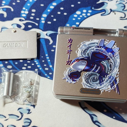 Silver Gameboy Advance SP shell with embossed Kyogre UV print