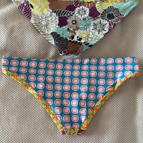Maui swimsuit used with two bottoms and pouch, multicolor