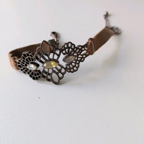 Bracelet with leather strap like new with metal clasp and rhinestones