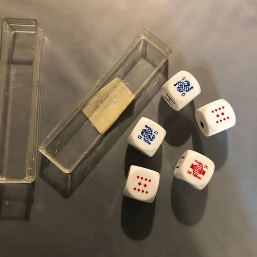 Dice set with playing card symbols used, with box