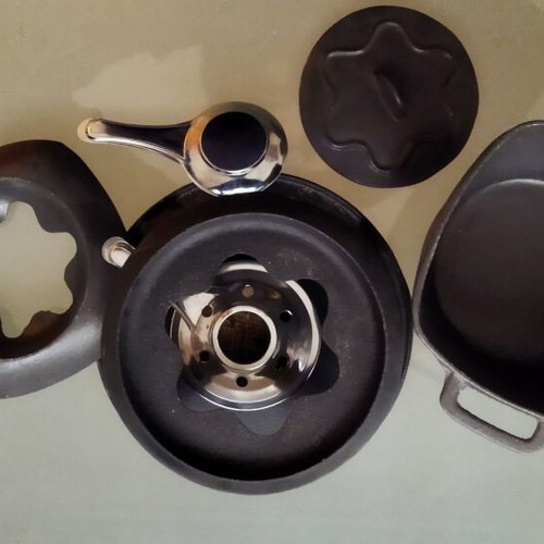 Cast iron fondue set like new