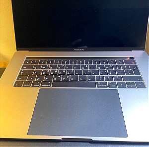 MacBook Pro 15" 2016 with TouchBar i7 2.6GHz / 16GB / 256GB / Radeon Pro 450/ Space Grey /