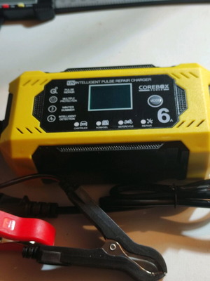 Battery charger 12V 6A with LCD screen and repair technology, new