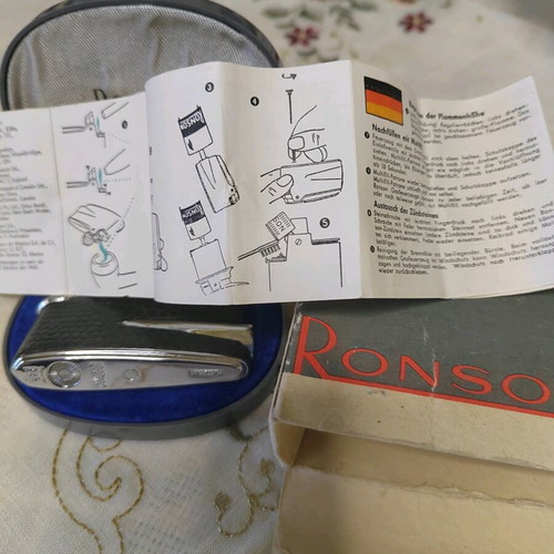 Ronson lighter used with case, instructions, and box
