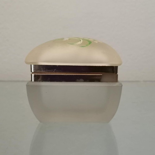 Glass vintage jewelry box used with floral decoration on lid