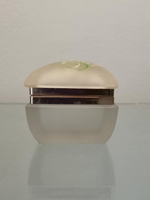 Glass vintage jewelry box used with floral decoration on lid