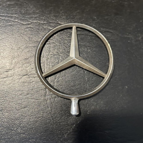 Mercedes car emblem like new from hood