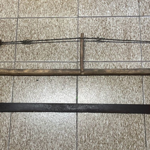 Old saw used from 1920-30 era museum piece