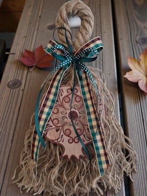 Handmade hanging charm with large wooden pomegranate in beige and burgundy