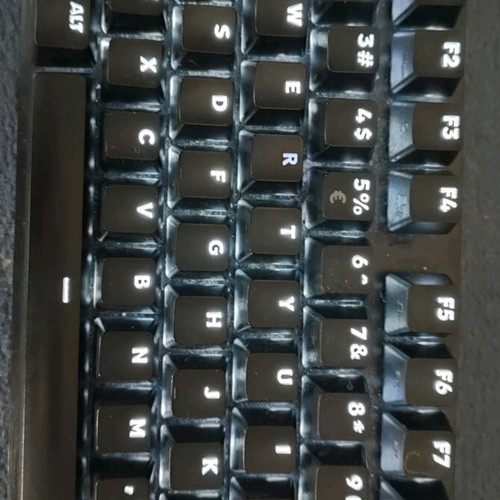 Logitech G413 SE mechanical gaming keyboard used with illuminated US keys