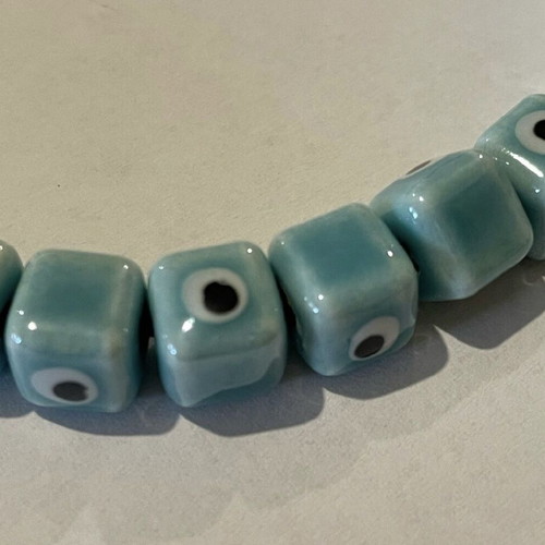 Enamelled ceramic cube-shaped evil eye beads, new, turquoise
