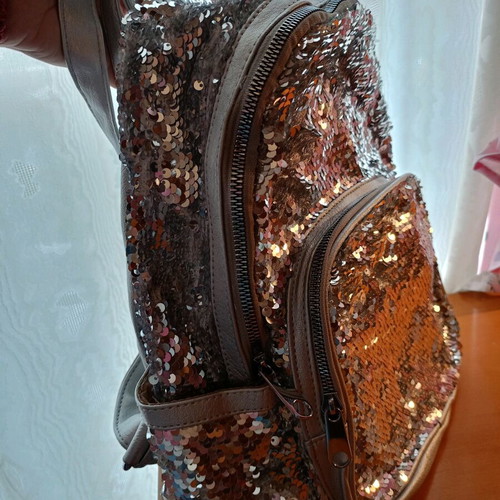 Lame backpack like new, silver