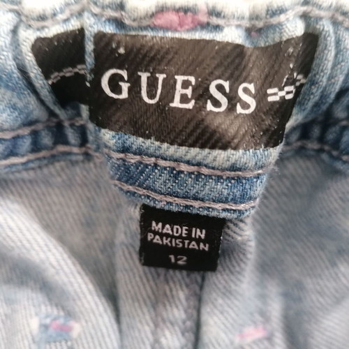 Guess girls' jeans like new with logo and street style design, age 12