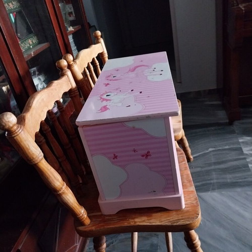 Wooden unicorn toy box with defect