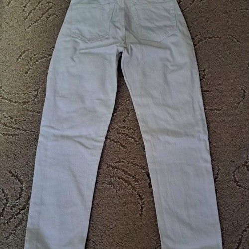 Modern girls' jeans with colorful graffiti
