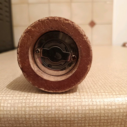 Wooden pepper mill used with steel mechanism