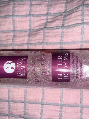 Glitter body mist used, spray with fragrance and glitter