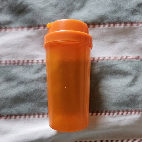 Plastic cup with lid 5 dl like new, orange