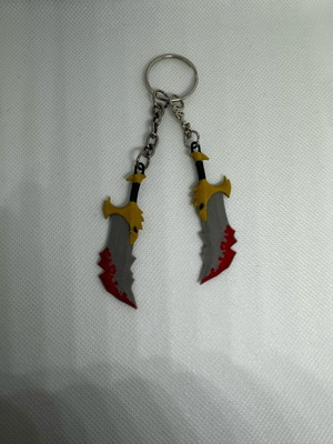Blades Of Chaos keychain like new, gray and red