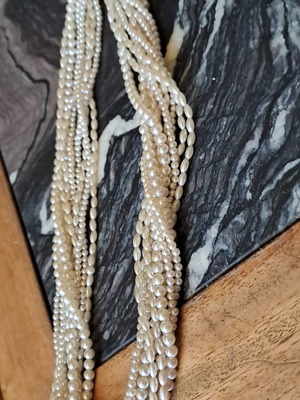 Pearl necklace new, over 40 years old