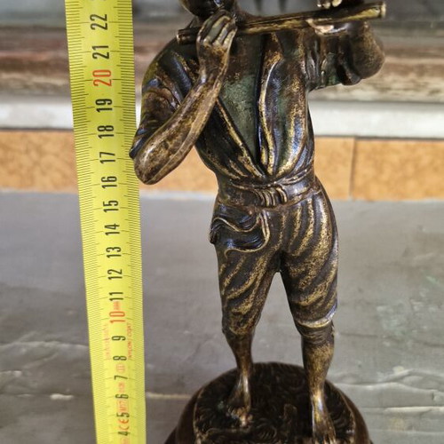 Vintage bronze sculpture of a boy playing flute used