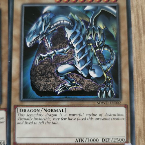 Blue Eyes White Dragon set like new with extras gifts in cases