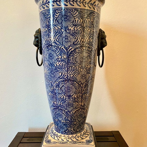 Decorative ceramic vase like new with brass fittings and wooden base