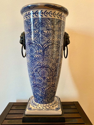 Decorative ceramic vase like new with brass fittings and wooden base