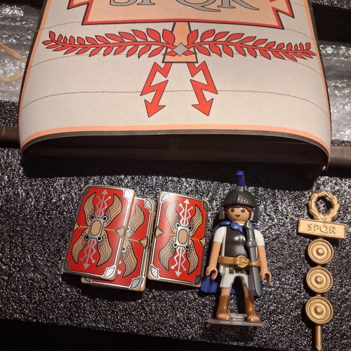 Playmobil Roman set used with character, gun, helmet, shields, boat, and horses
