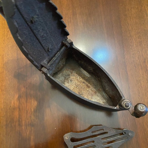 Antique charcoal iron used, cast iron with wooden handle