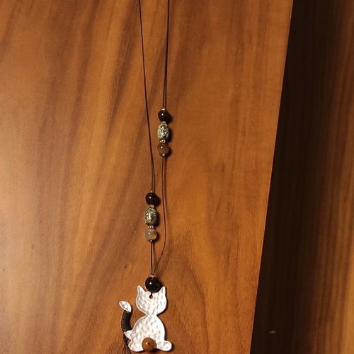 Necklace used, long with beads and metal cat pendant