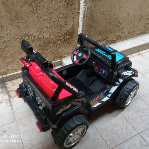 Children's Electric Car 12V 4x4 like new, two-seater with music