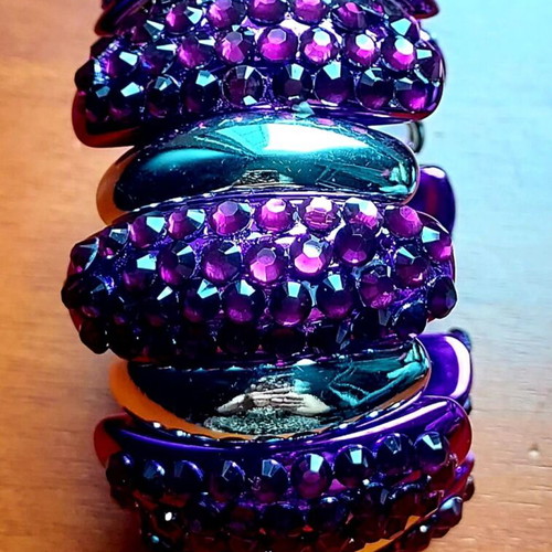 Bracelet with purple rhinestones and silver elements like new
