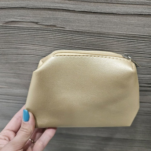 Small toiletry bags like new, gold and silver