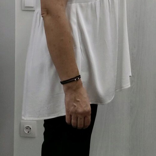 Celestino white short-sleeve blouse with ruffles on sleeve like new, size L