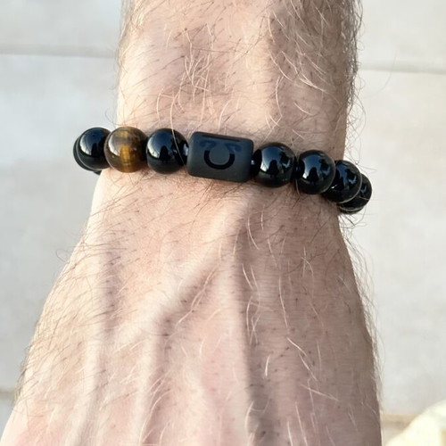 Unisex bracelet with black and brown beads like new