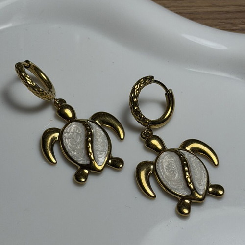 Handmade earrings made of steel, gold color, new