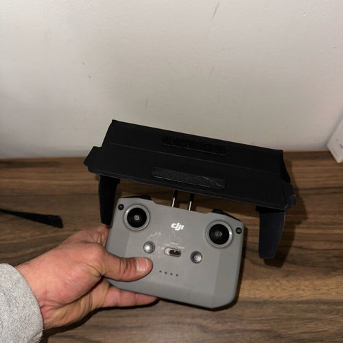 DJI controller like new with sunshade, charging hub, 3 batteries and carrying bag