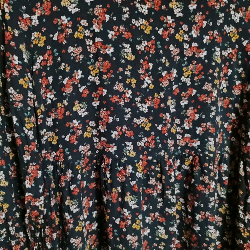 Floral mini dress L like new with crisscross detail on back