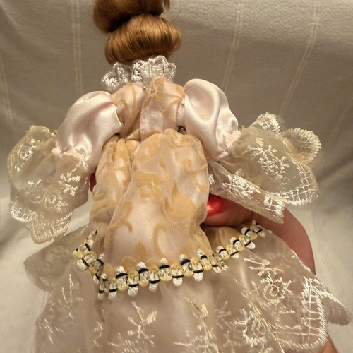 Porcelain doll vintage used, girl on stand