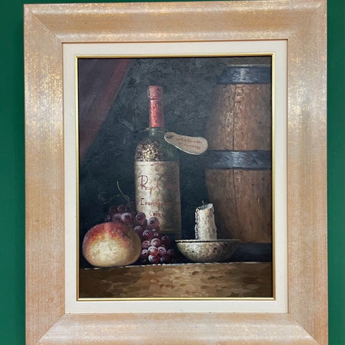 Oil painting used with wine bottle theme in frame