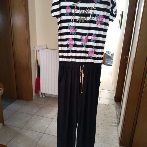 Derpouli jumpsuit size L 40 12 like new, black and multicolor