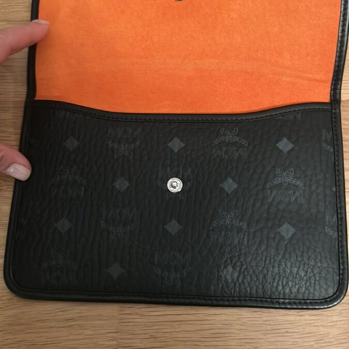 MCM collectible black crossbody bag like new with detachable pouch