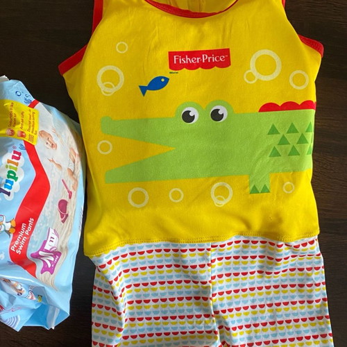 Fisher-Price children's swim vest and blocks used with free swim diapers