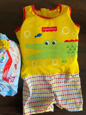 Fisher-Price children's swim vest and blocks used with free swim diapers